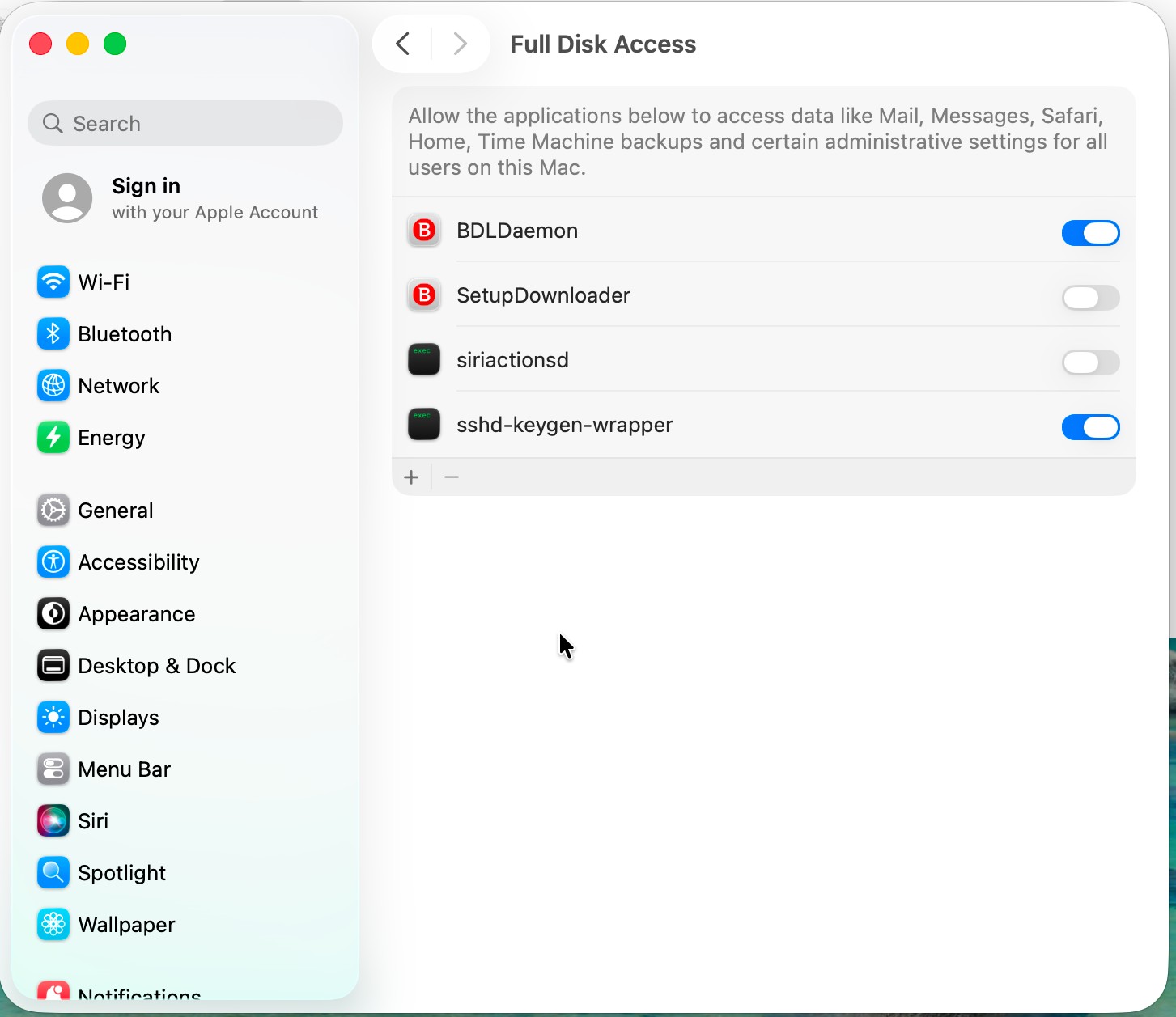macOS System Settings Full Disk Access panel showing BDLDaemon toggled on and SetupDownloader toggled off
